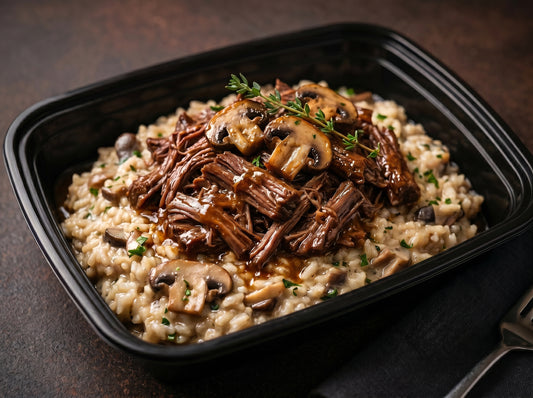 Slow-Braised Beef Served Over a Bed of Creamy Mushroom Risotto