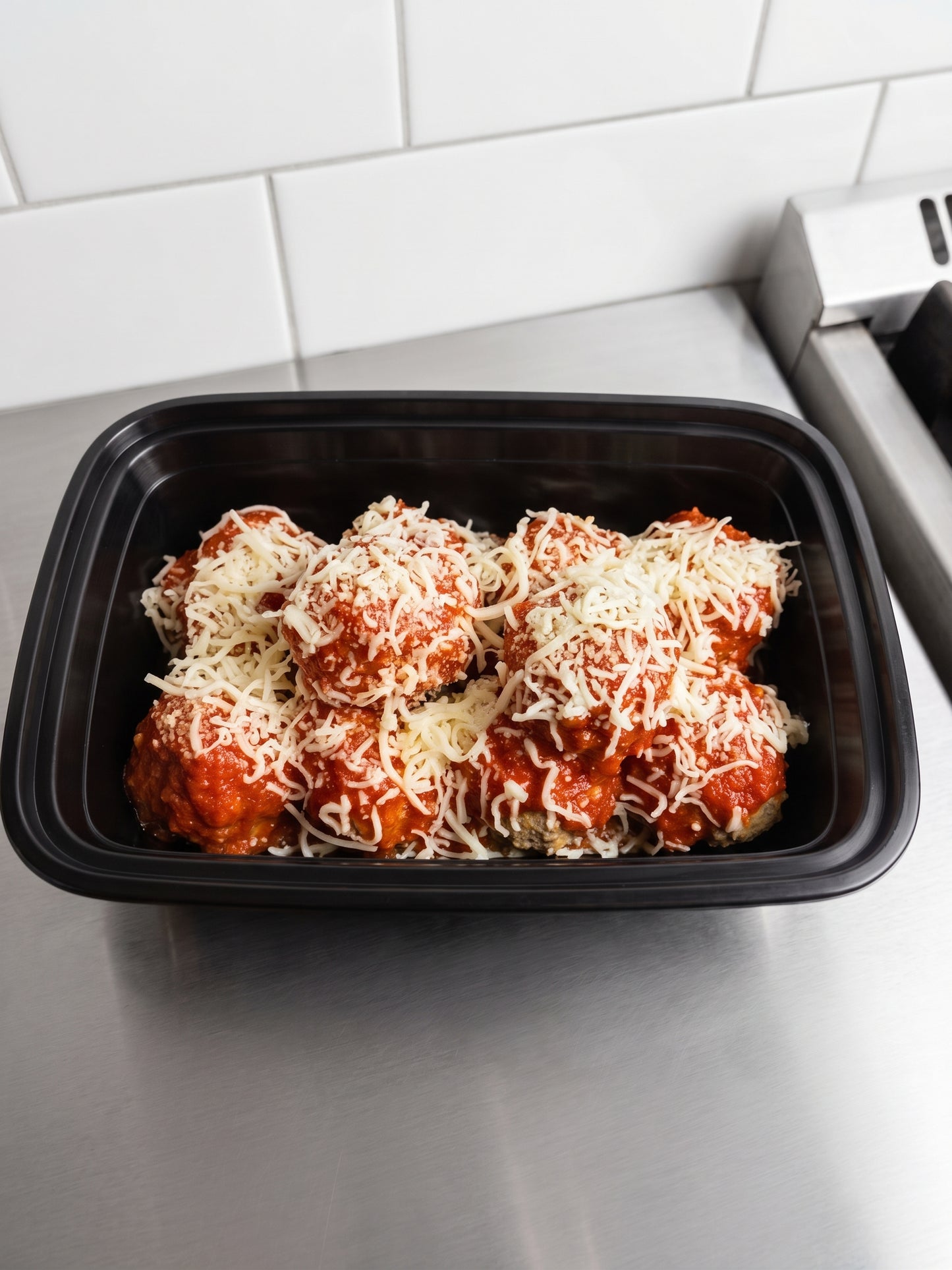 10 Homemade Meatballs topped with Marinara and Italian Blend Shredded Cheese